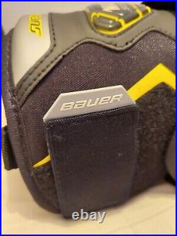 Bauer Supreme Black, Yellow, Grey and White Max Sorb Knee Guards